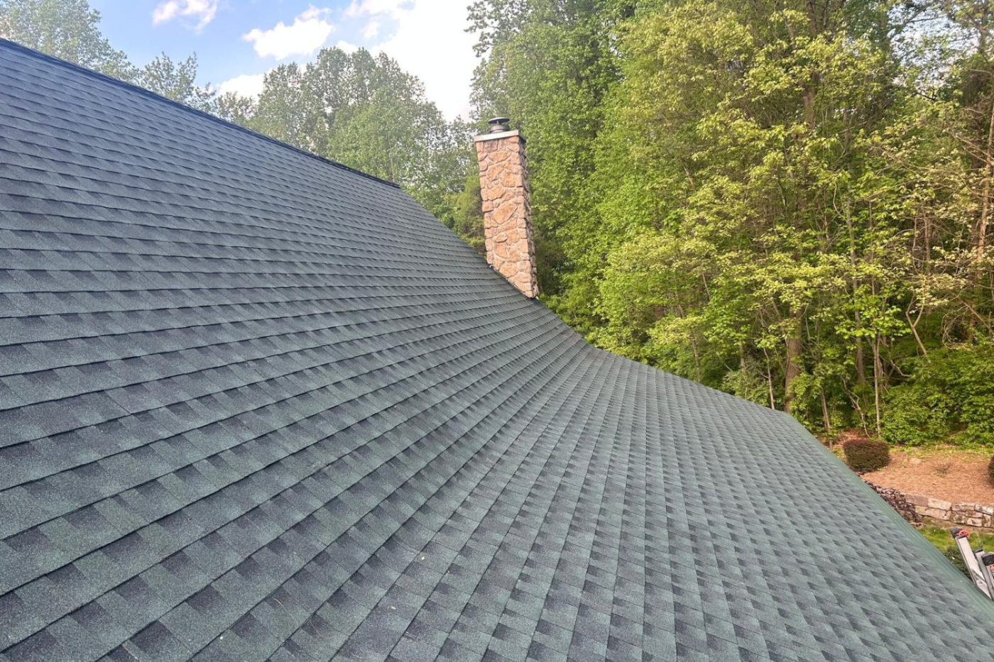 hunter green shingles on a cabin roof in mohnton pa